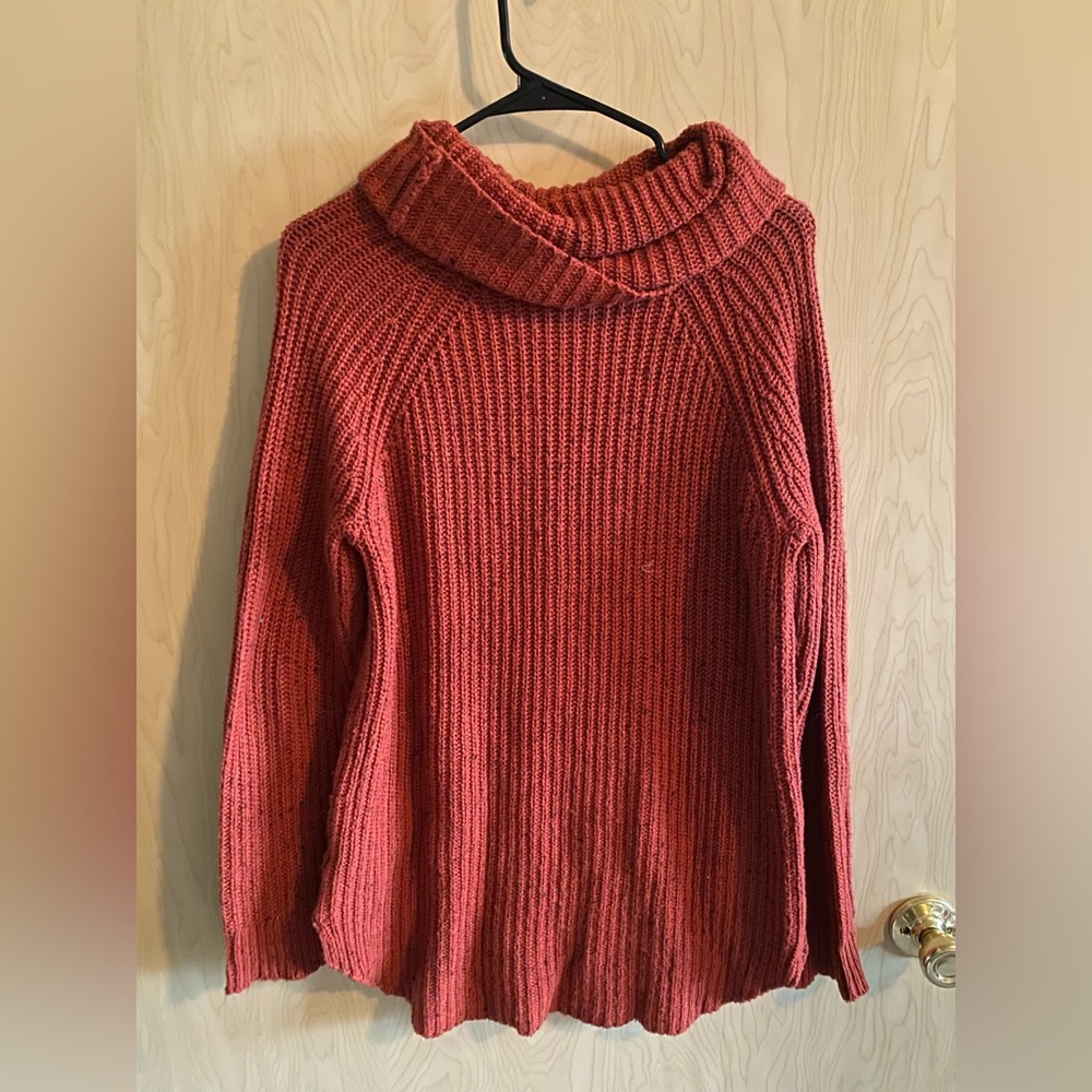 Orange turtleneck sweater